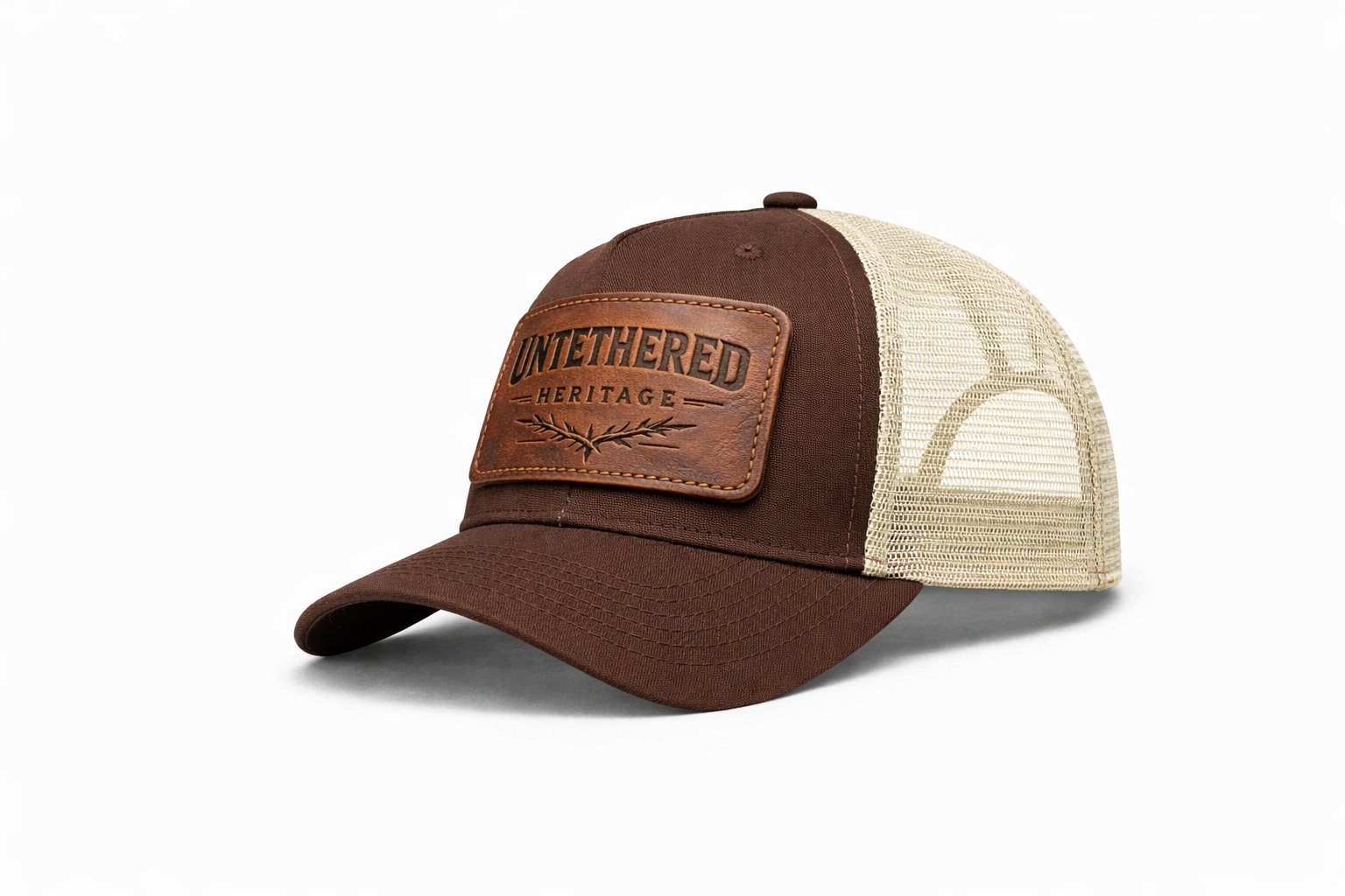 Untethered Heritage — brown and cream trucker cap with debossed leather patch