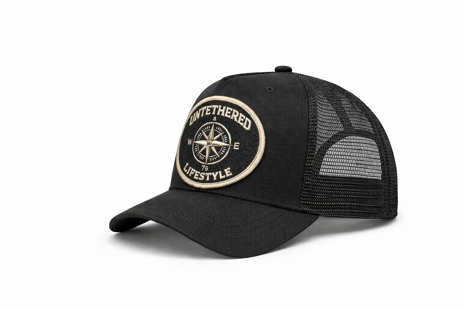 Untethered Lifestyle — black trucker cap with compass rose circular patch